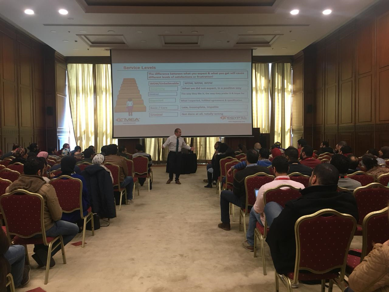 Amr ELHariry presenting at a large training event
